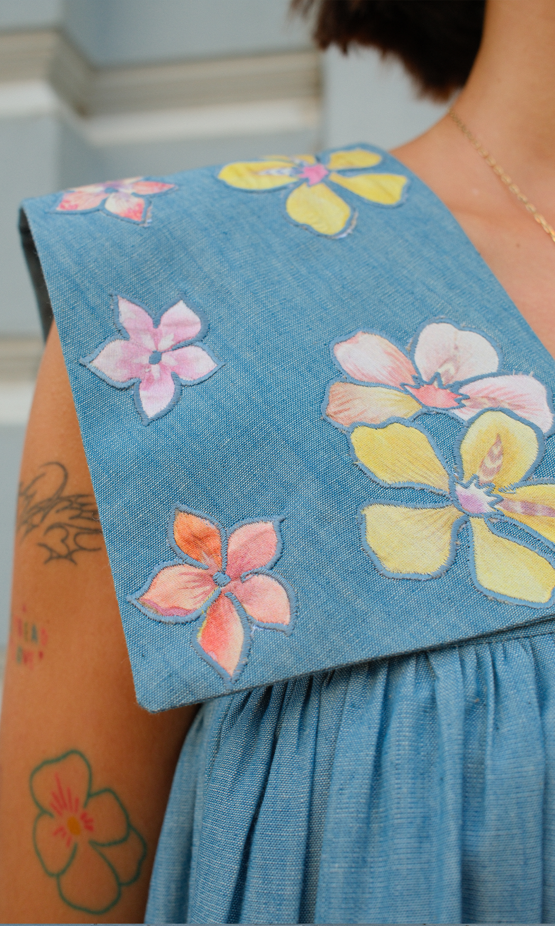 Clara- Flared denim dress with appliqué work