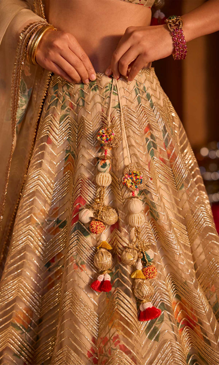 Iqra- Gold chanderi lehenga with hand embroidered blouse and organza dupatta (set of 3)